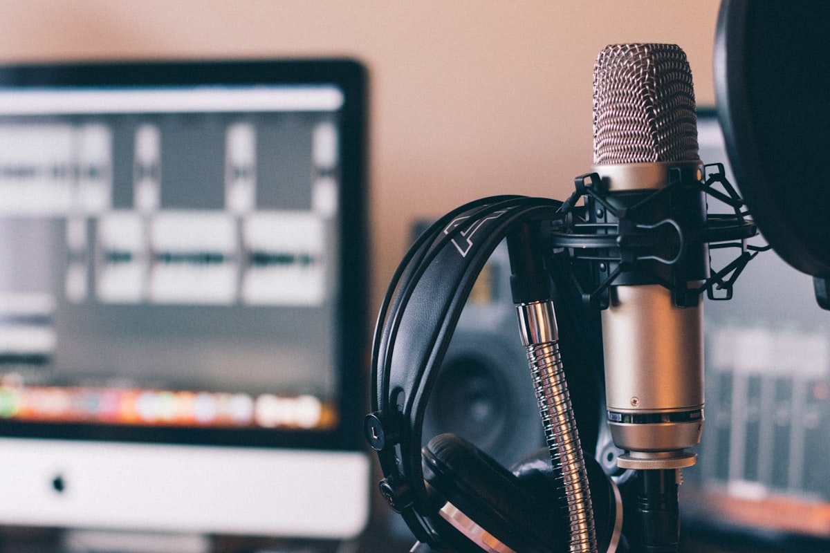AI voice synthesis studio setup with waveforms